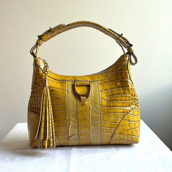 Cole Haan Handbags - Cole Haan faux crocodile leather yellow shoulder bag with tassel zipper detail